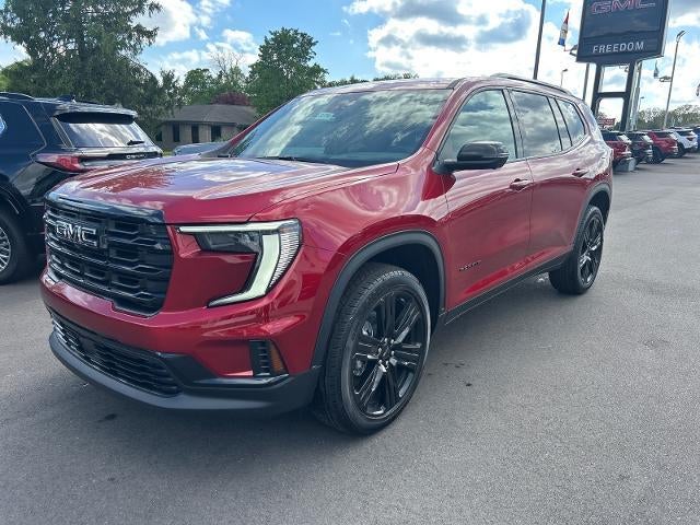 2026 GMC Acadia Elevation in Volcanic Red Tintcoat — front three-quarter view
