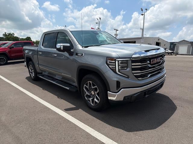 2026 GMC Sierra 1500 SLT in Sterling Metallic — front three-quarter view