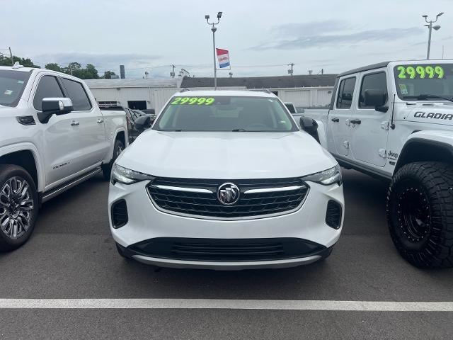 2023 Buick Envision Essence in White Frost Tricoat — front three-quarter view